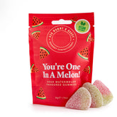 Red package of Sour Watermelon Gummies with watermelon slices and text on a white background